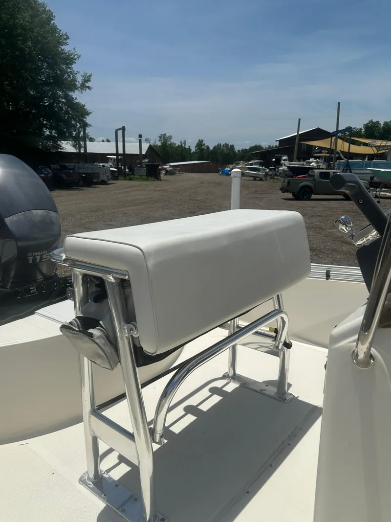 Slide: The Image of 2008 Key West 186 Bay Reef boat with white seating and chrome details. - 13