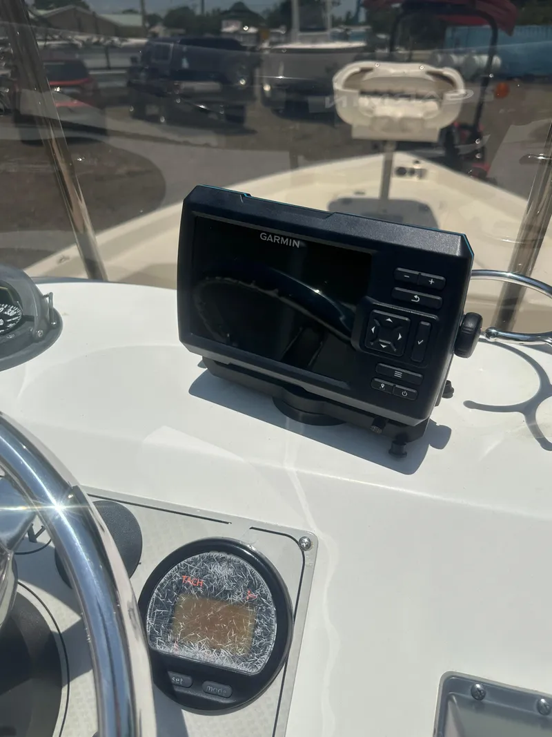 Slide: The Image of Console of 2008 Key West 186 Bay Reef boat with Garmin GPS and tachometer. - 16