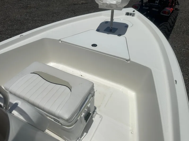 Slide: The Image of 2008 Key West 186 Bay Reef boat interior with seating and storage compartments. - 19