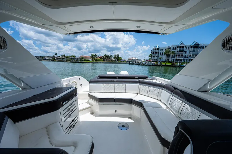 Slide: The Image of 2017 Sea Ray 31 SLX luxury boat interior with waterfront view. - 21
