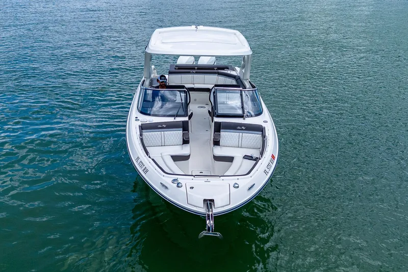 Slide: The Image of 2017 Sea Ray 31 SLX boat on calm water, aerial view. - 4