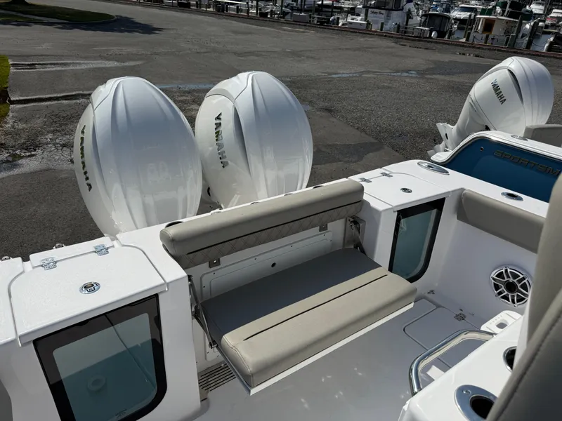 Slide: The Image of 2025 Sportsman Open 262 Center Console with Yamaha engines and seating area. - 9