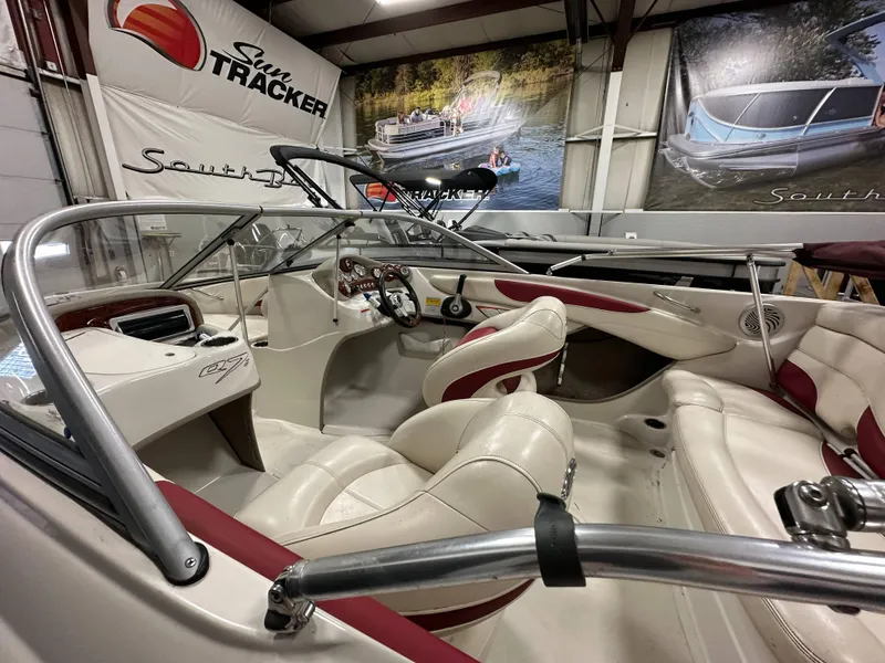 Slide: The Image of 2014 Tahoe Q7SSI boat interior at Westre's Marine & Sport showroom. - 15