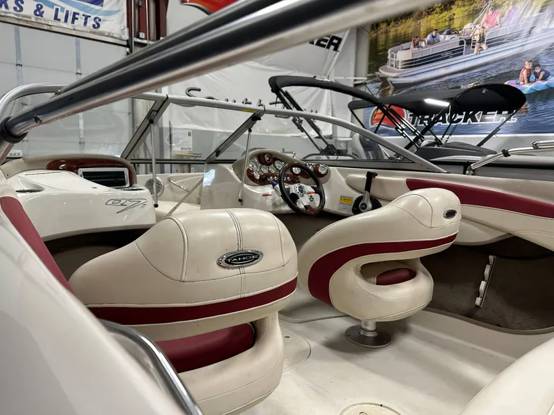 Slide: The Image of 2014 Tahoe Q7SSI boat interior at Westre's Marine & Sport showroom. - 16
