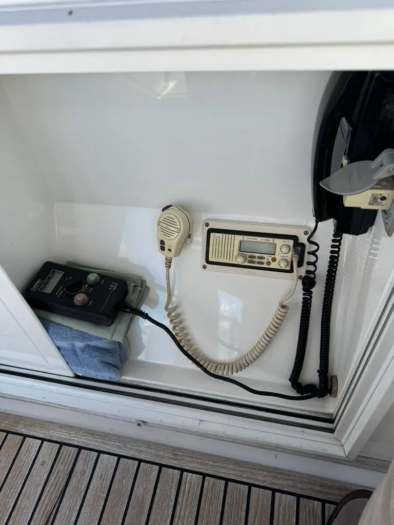 Slide: The Image of Control panel and radio equipment on a 1999 Grand Banks 42 Motoryacht. - 23