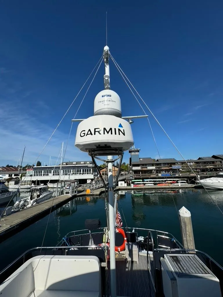 Slide: The Image of 1999 Grand Banks 42 Motoryacht with Garmin equipment at marina dock. - 28