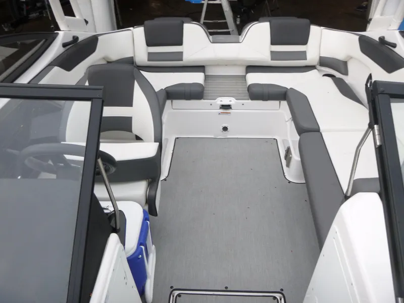 Slide: The Image of 2021 Yamaha AR210 boat interior with spacious seating and modern design. - 5