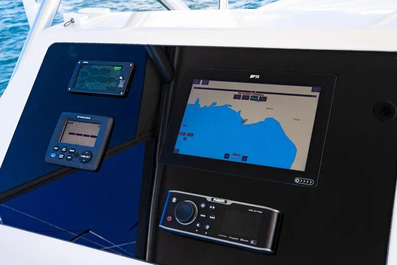 Slide: The Image of Navigation and control panel on 2006 Viking 56 Convertible yacht. - 17