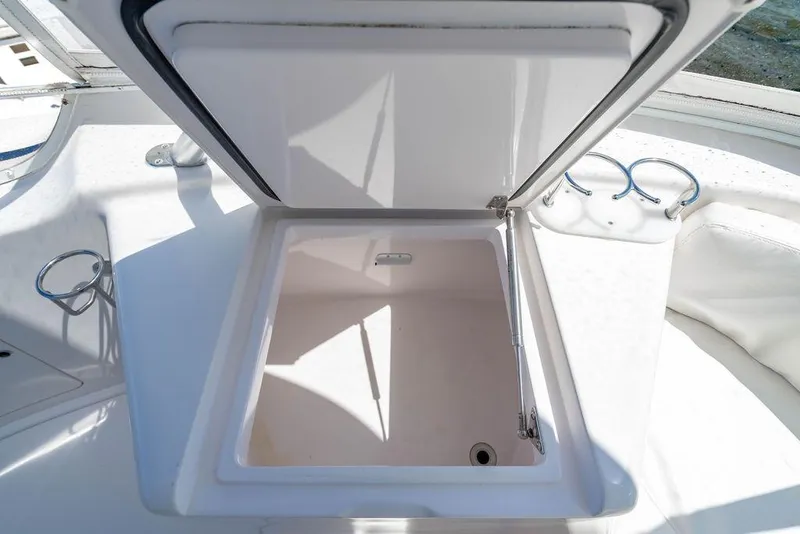 Slide: The Image of Open storage compartment on 2006 Viking 56 Convertible yacht deck. - 21
