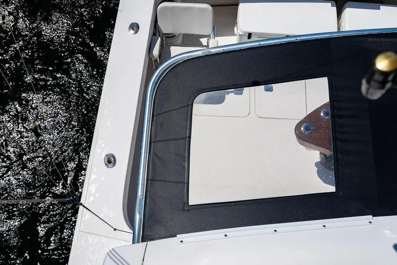 Slide: The Image of Overhead view of 2006 Viking 56 Convertible yacht deck with water reflection. - 57