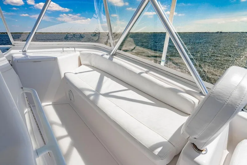 Slide: The Image of Luxurious seating on 2006 Viking 56 Convertible yacht with ocean view. - 58