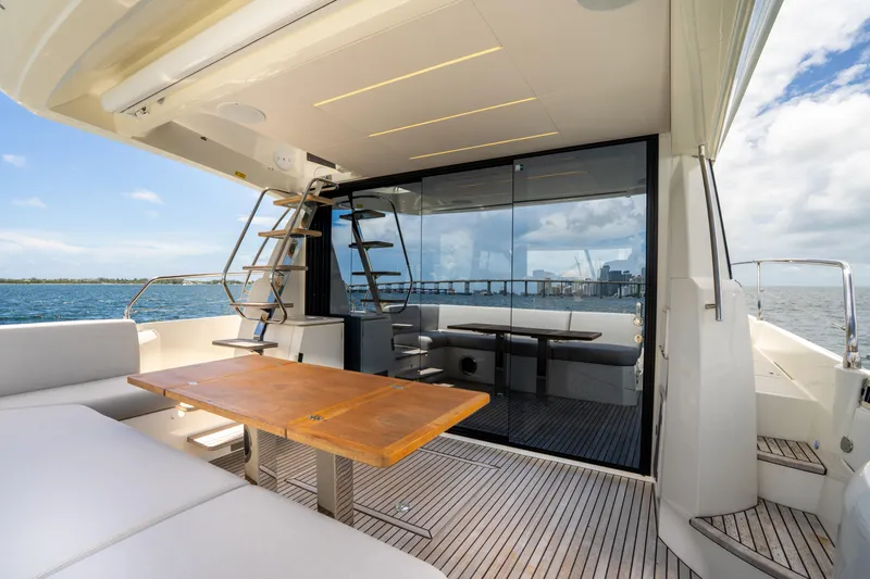 Slide: The Image of Luxurious 2023 Prestige 520 yacht with spacious deck and modern interior design. - 17