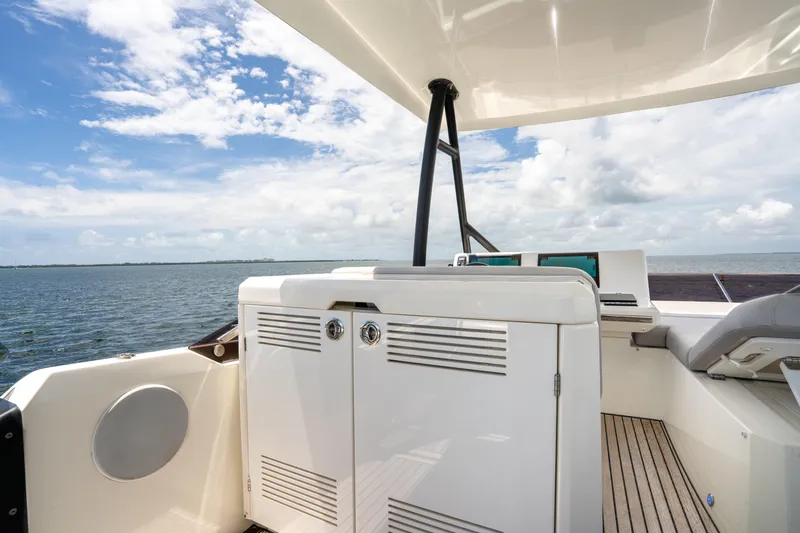 Slide: The Image of Luxury 2023 Prestige 520 yacht interior with ocean view and modern design. - 37