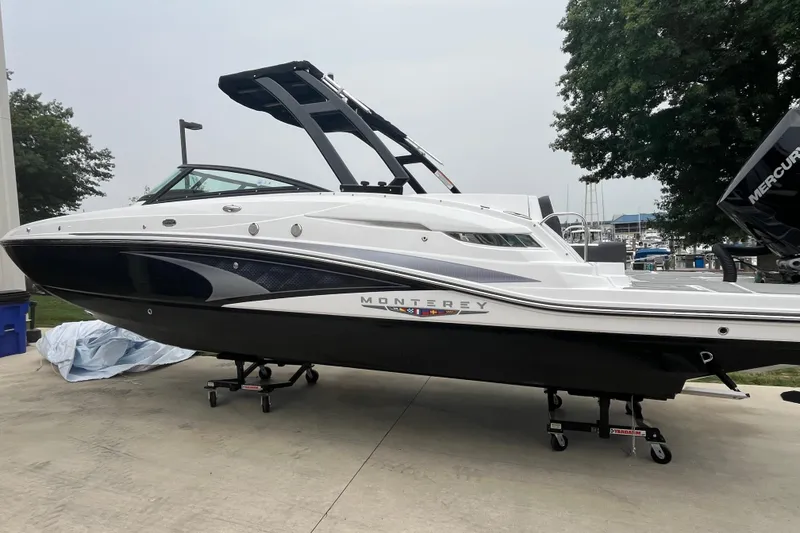 The Image of 2026 Monterey M-65 boat on display, featuring sleek design and modern features. - 0