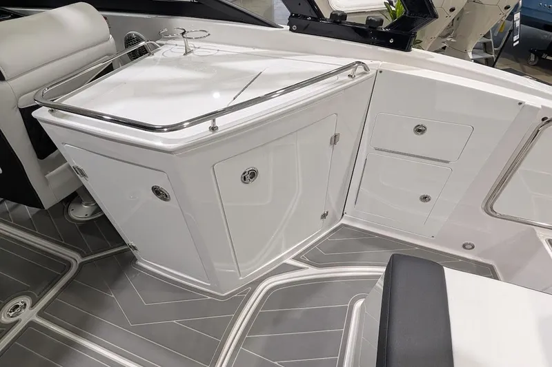 Slide: The Image of Luxurious interior of 2026 Monterey M-65 boat featuring sleek cabinetry and modern design. - 9