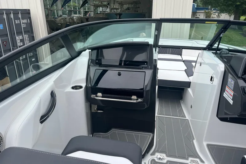 Slide: The Image of 2026 Monterey M-65 boat interior with sleek seating and modern dashboard design. - 3