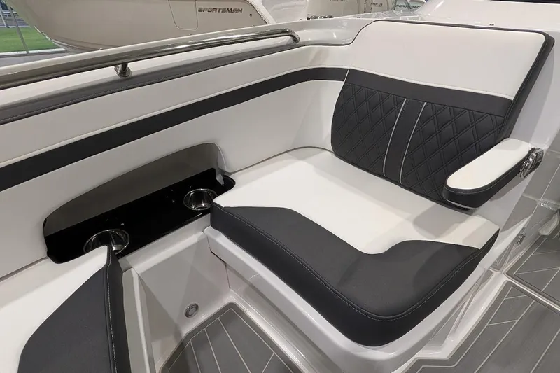Slide: The Image of Luxurious seating on 2026 Monterey M-65 boat with cup holders and sleek design. - 23