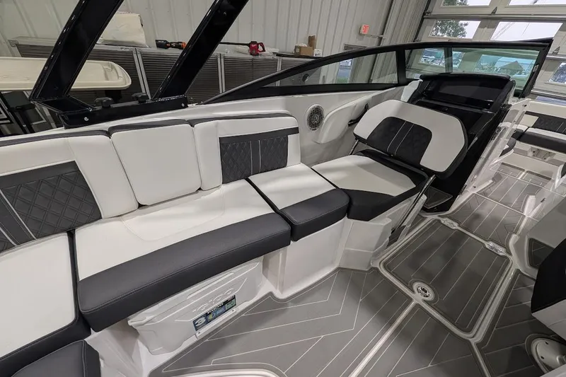 Slide: The Image of 2026 Monterey M-65 boat interior with sleek seating and modern design. - 8