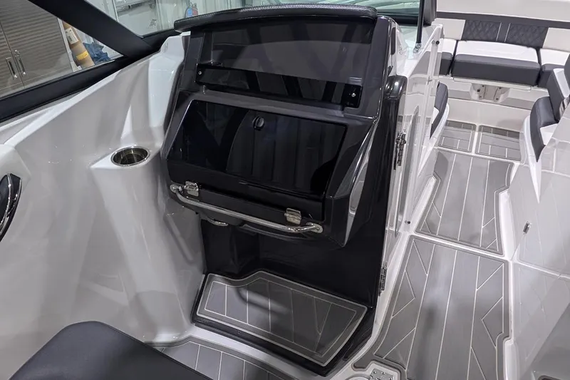 Slide: The Image of Interior of 2026 Monterey M-65 boat, featuring sleek design and modern seating. - 17