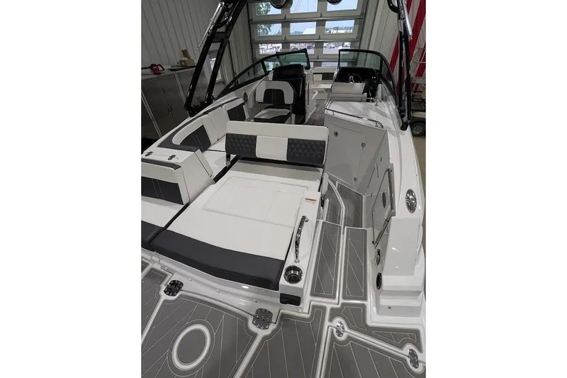 Slide: The Image of 2026 Monterey M-65 boat interior with sleek seating and modern design. - 4