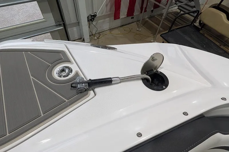 Slide: The Image of Bow area of a 2026 Monterey M-65 boat with a fuel fill cap. - 27