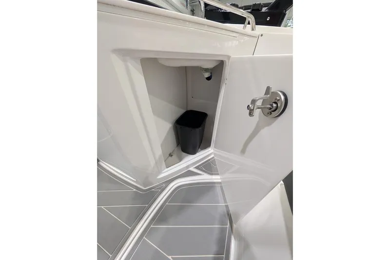 Slide: The Image of Storage compartment on 2026 Monterey M-65 boat with sleek design and modern handle. - 10