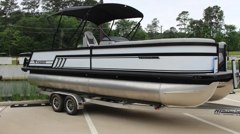The Image of 2025 Viaggio Diamante U pontoon boat on trailer, parked outdoors. - 0