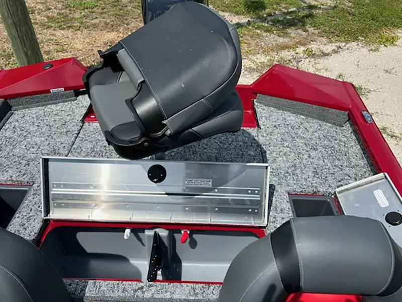 Slide: The Image of 2025 Tracker Pro Team 175 boat interior with seating and storage compartments. - 9