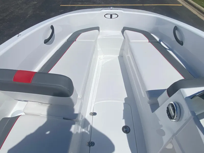 Slide: The Image of 2025 Tahoe T16 boat interior with white and gray seating, red accents. - 3