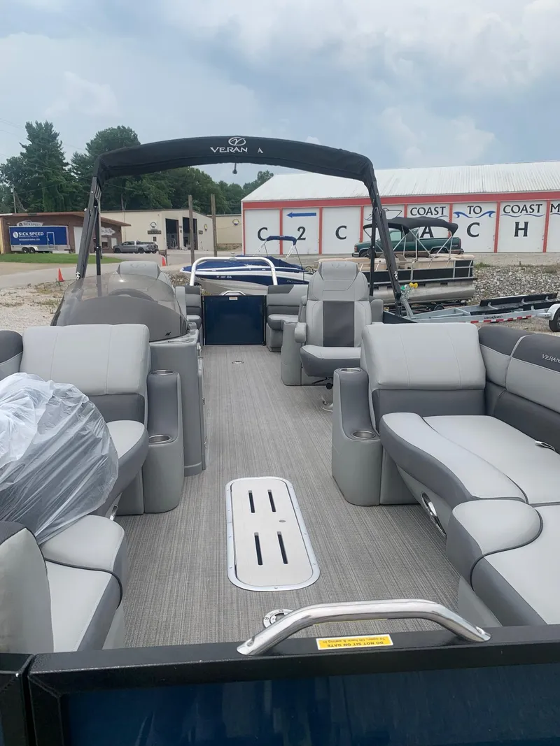 Slide: The Image of 2019 Veranda Relax VR25RC boat seating with gray upholstery and cup holder. - 10