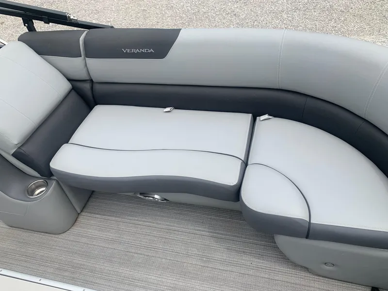 Slide: The Image of 2019 Veranda Relax VR25RC with Yamaha VMAX outboard motor, parked on gravel. - 7