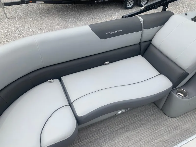 Slide: The Image of Open storage compartment on 2019 Veranda Relax VR25RC boat with rope inside. - 8