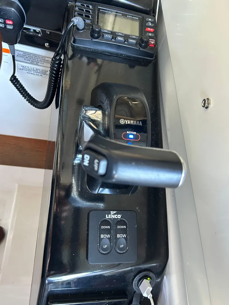 Slide: The Image of Control panel of a 2017 Cutwater C-242 Coupe with Yamaha throttle and Lenco trim tabs. - 8