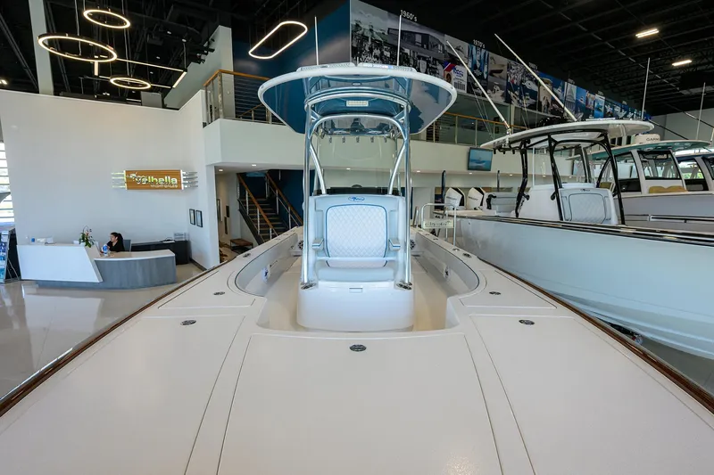 Slide: The Image of 2026 Valhalla Boatworks V-28 displayed in a modern showroom. - 10