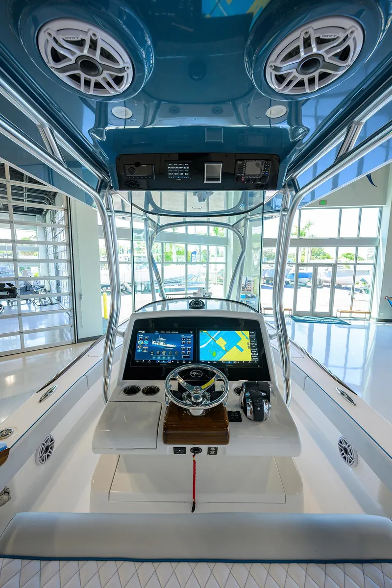 Slide: The Image of 2026 Valhalla Boatworks V-28 helm with advanced navigation system and sleek design. - 11