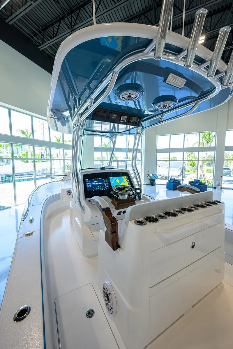 Slide: The Image of 2026 Valhalla Boatworks V-28 interior with modern helm and navigation system. - 14