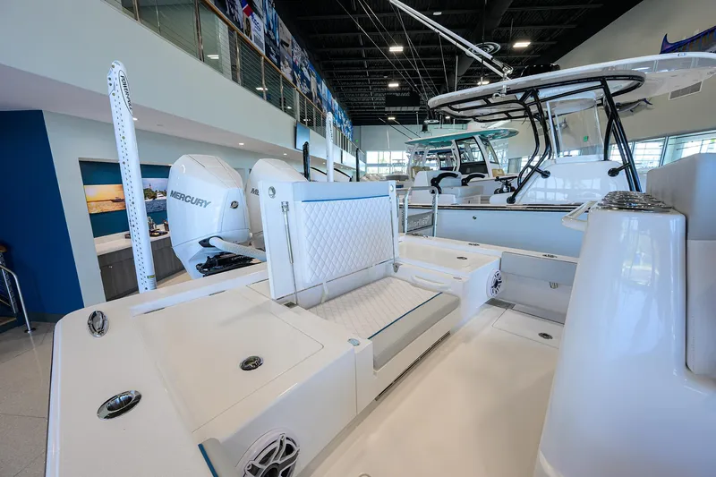 Slide: The Image of 2026 Valhalla Boatworks V-28 interior with Mercury engines in showroom. - 21