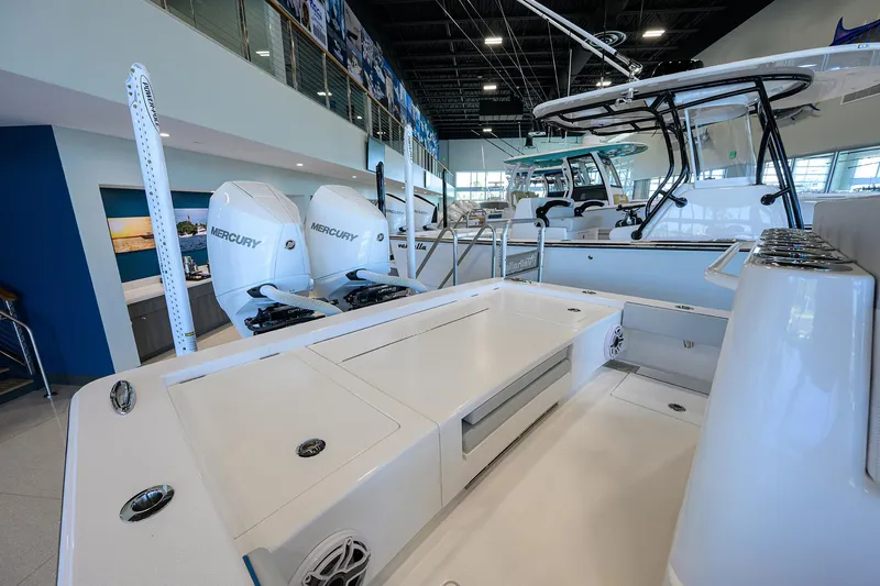 Slide: The Image of 2026 Valhalla Boatworks V-28 with dual Mercury engines in showroom. - 22
