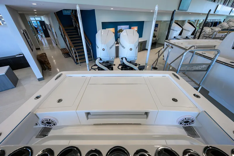 Slide: The Image of 2026 Valhalla Boatworks V-28 with dual Mercury engines in showroom. - 25