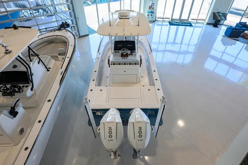 Slide: The Image of 2026 Valhalla Boatworks V-28 with dual 300 HP engines in showroom. - 26