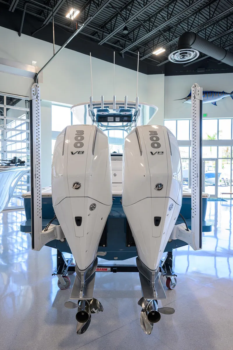 Slide: The Image of 2026 Valhalla Boatworks V-28 with dual 300 V8 engines in showroom. - 27