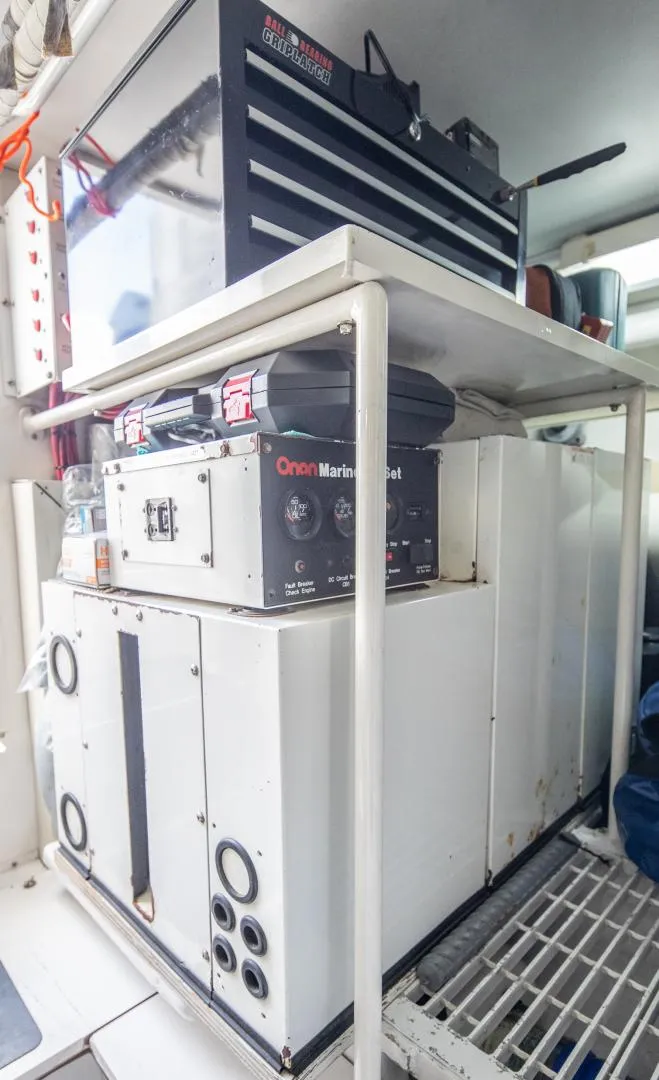 Slide: The Image of Marine equipment and tool storage on a 1999 Viking 58 Enclosed Bridge yacht. - 38