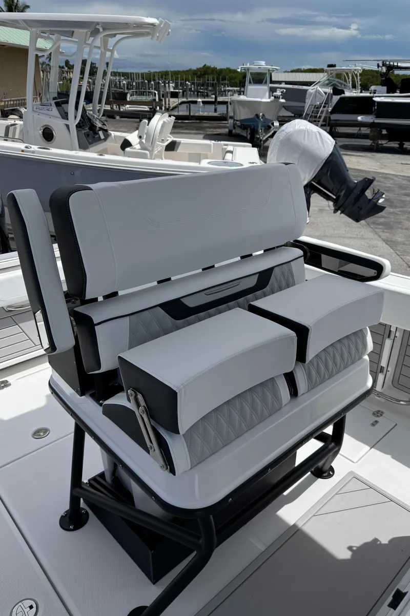 Slide: The Image of 2025 Blackfin 252 CC boat seating with modern design and comfortable cushions. - 9