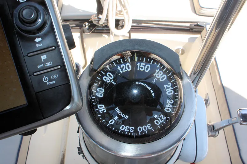 Slide: The Image of Compass and navigation equipment on a 2004 Pacific Seacraft 31 sailboat. - 20