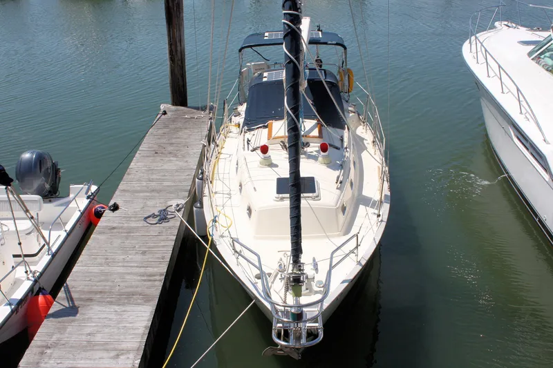 Slide: The Image of 2004 Pacific Seacraft 31 sailboat docked in marina, viewed from above. - 4