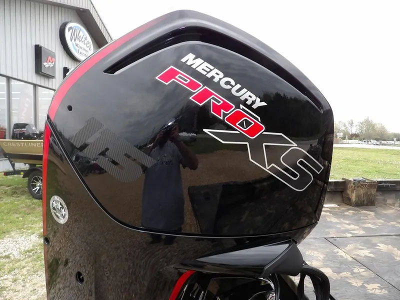 Slide: The Image of Mercury Pro XS engine on 2025 Crestliner 2070 Retriever SCHD boat at marine center. - 37