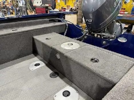 Slide: The Image of 2023 G3 Angler V164 C boat interior with Yamaha motor, featuring gray seating and storage. - 3