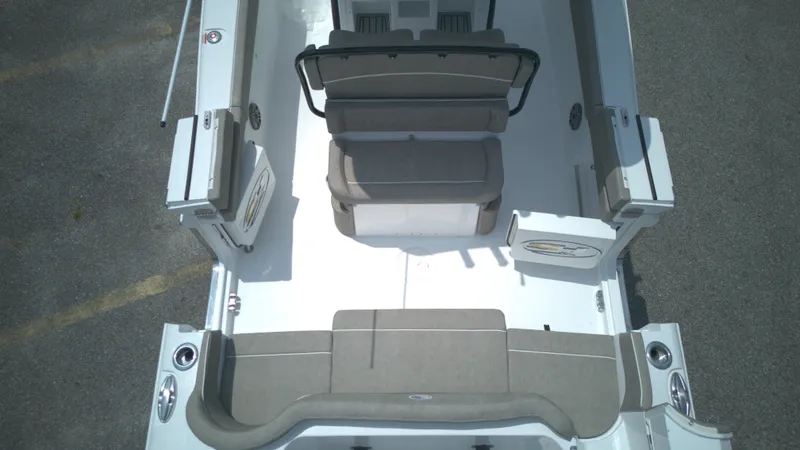 Slide: The Image of 2026 Sea Hunt Ultra 265 SE boat interior with seating and storage compartments. - 4