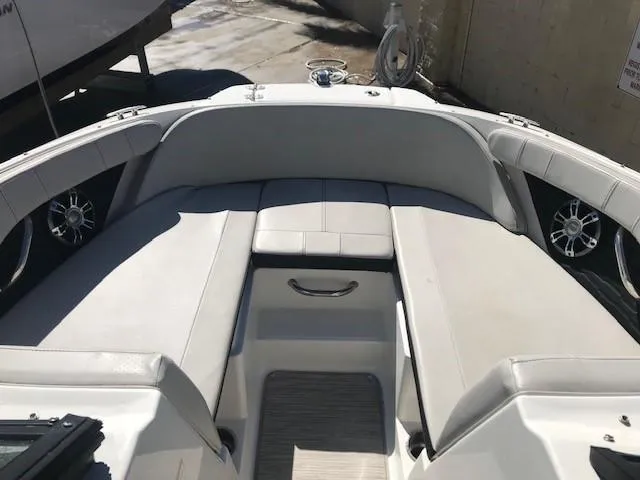 Slide: The Image of 2022 Sea Ray SPX 190 OB boat interior with cushioned seating and modern design. - 18
