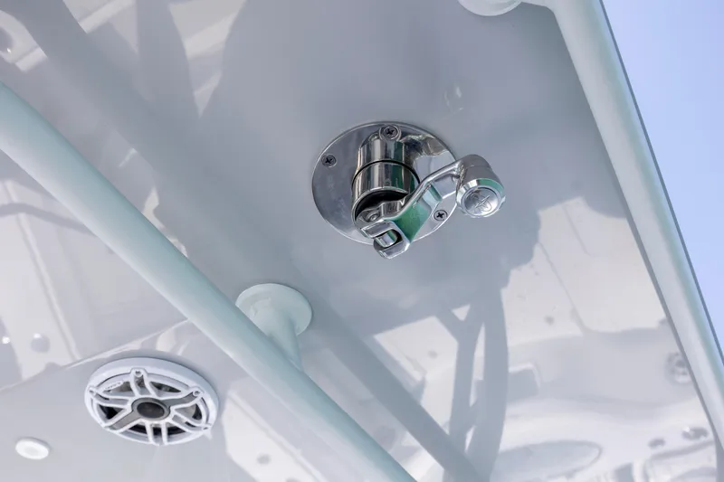 Slide: The Image of Close-up of a 2026 Yellowfin 36 Offshore boat's ceiling hardware and speaker. - 21